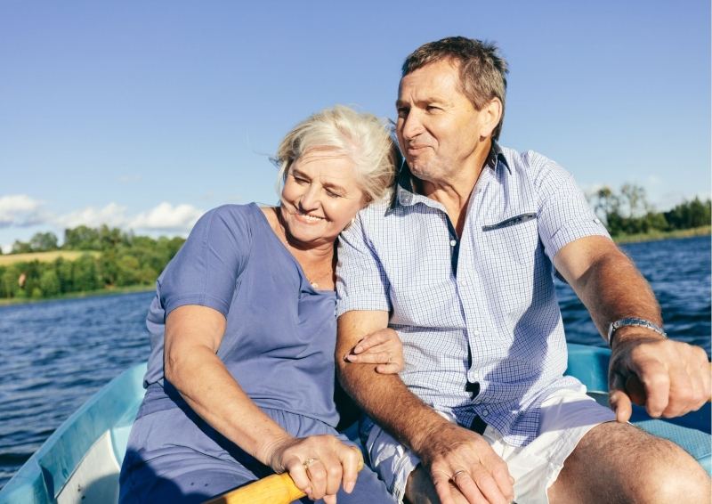 Older Couple in a row boat