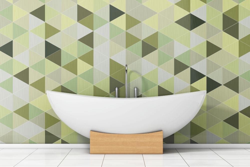 Bath with a fancy green tile wall