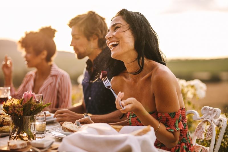 People enjoying food and conversation